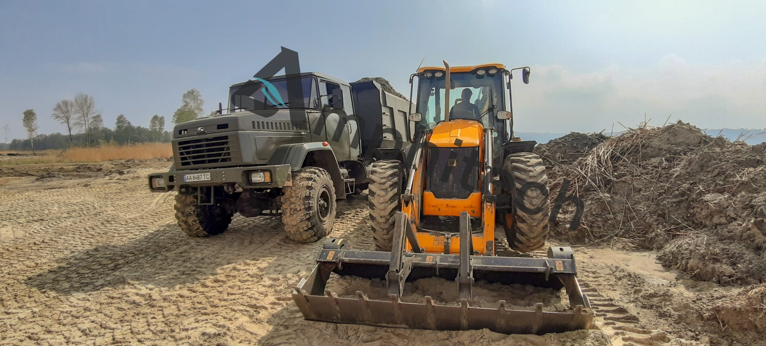 краз и погрузчик